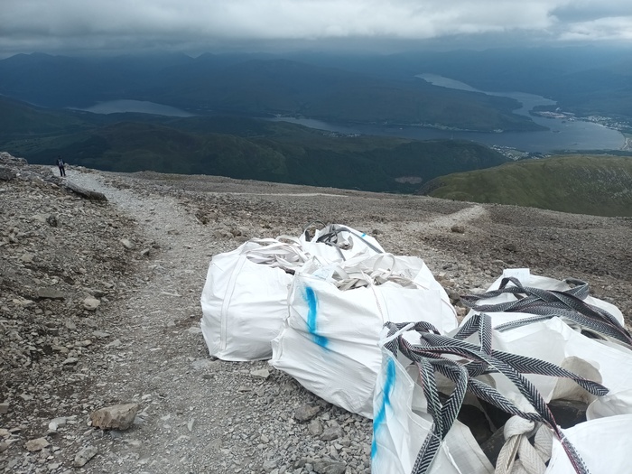 Helicopter lift July 24 - bags of stone